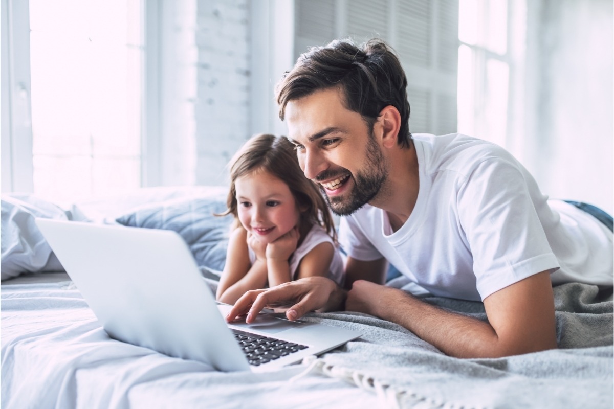 dad and daughter in on computer