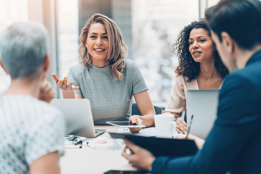 Corporate team discussing at a table