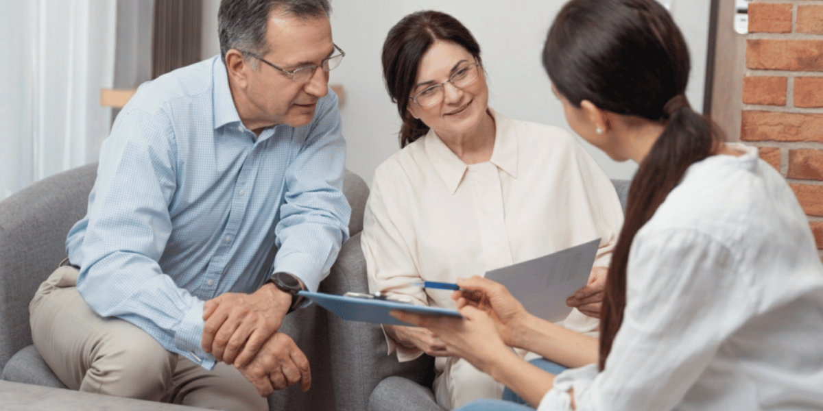 60 year old couple meeting with attorney to plan inheritence